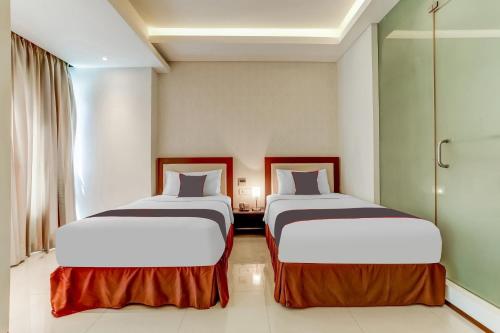 Delxue Twin Room image 4