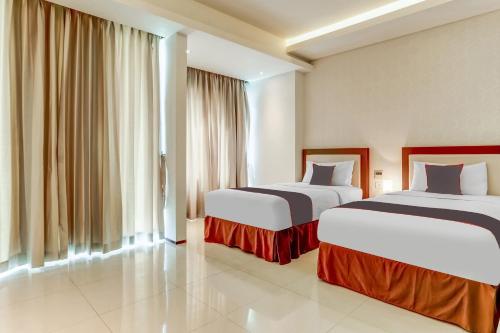 Delxue Twin Room image 3
