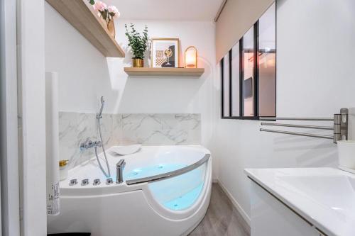 L'ARCADE SECRETE Appartement climatisé, Jacuzzi, Borne d'arcade Bordeaux centre, Bordeaux (Foto 3)