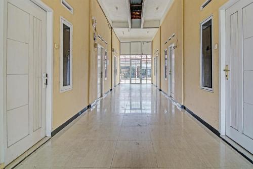 Lobby, Hotel O Lucky Guesthouse in Tuah Karya