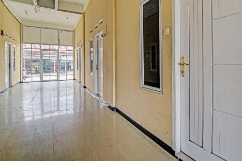 Lobby, Hotel O Lucky Guesthouse in Tuah Karya