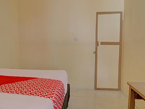 Hotel O Excellent Kost - Tap to explore photos