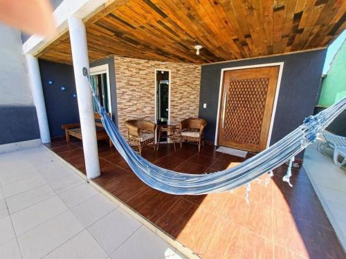 Casa com 3 suítes em Cabo Frio com piscina há poucos passos do Mar! (Casa com 3 suites em Cabo Frio com piscina ha poucos passos do Mar!) in Unamar