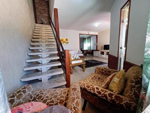 Casa com 3 suítes em Cabo Frio com piscina há poucos passos do Mar! (Casa com 3 suites em Cabo Frio com piscina ha poucos passos do Mar!) in Unamar