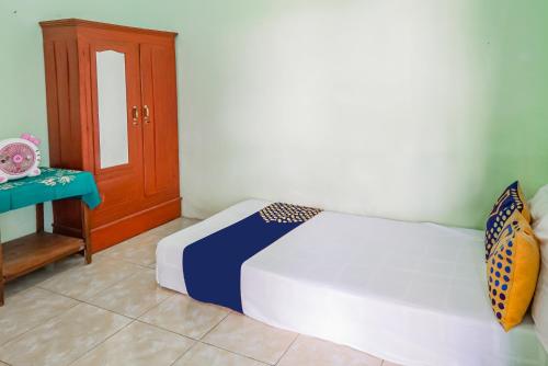 Hotel O Wunut Homestay Syariah Room Type - Budget Double Room