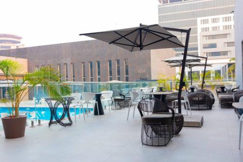 شرفة/ تراس, Palms by Eagles Airport City, Formerly Holiday Inn in رومان ريدج