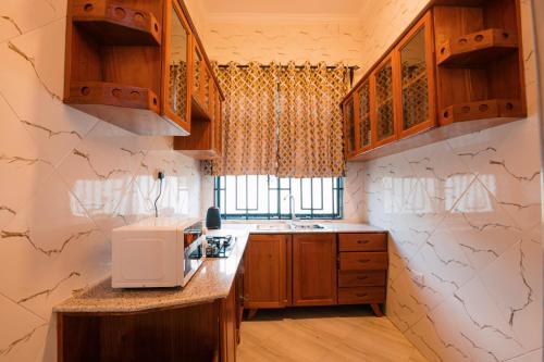 virtuve, Omega Luxury Apartments in Tabora