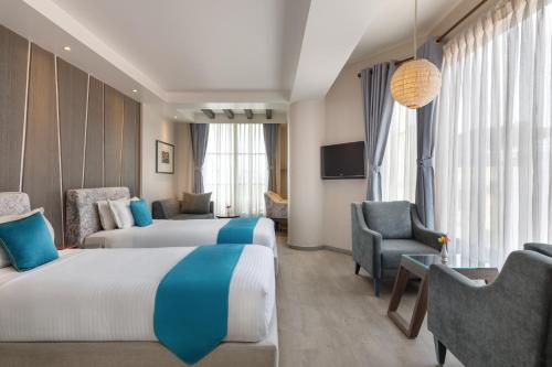 Shared lounge/TV area, Kathmandu Guest House by KGH Group in Kathmandu