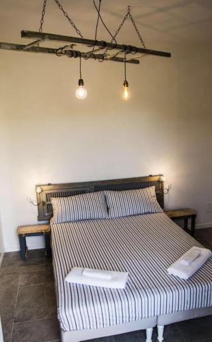 Apartment Sotto Il Santo Room Type - Quadruple Room with Private Bathroom