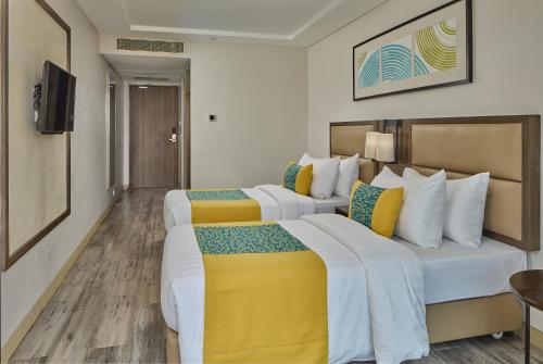 Deluxe Twin Room with Sea View room in Belmont Hotel Boracay near Newcoast Beach