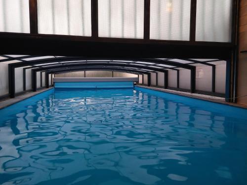 Úszómedence, Luxe gastenverblijf met wellness in het hart van Friesland in Heerenveen