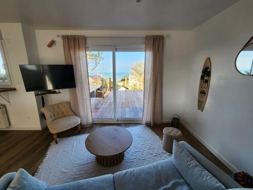 Shared lounge/TV area, Je m'y plais in Quiberville