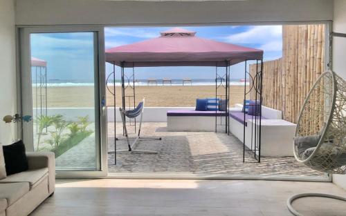 Casa de playa el descanso en Asía