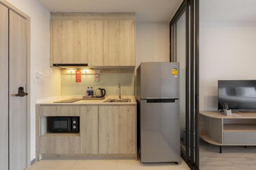 Salaya One Hotel & Service Apartment Room Type - Deluxe King Room