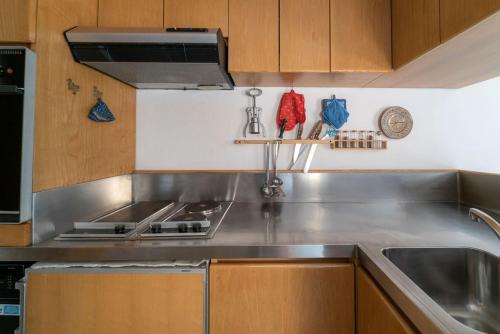 Kitchen, Tre Ville Retreat in Madonna di Campiglio