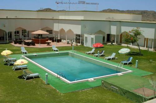 Swimming pool, OYO 142 Al Sharqiya Sands Hotel in Ibra
