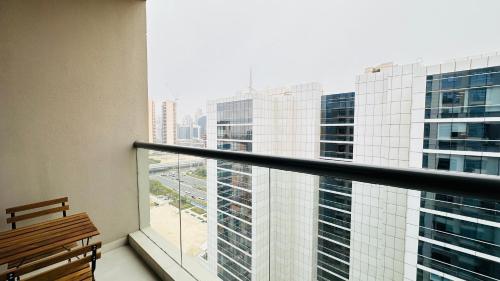Upscale Studio Apartment Business Bay with Balcony and Free Parking by BelVilla - image 6