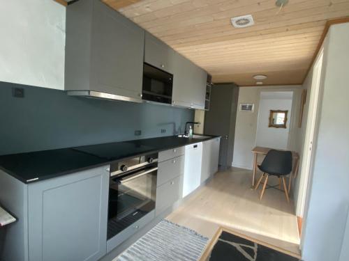 מטבח, Cosy apartment in Hósvík