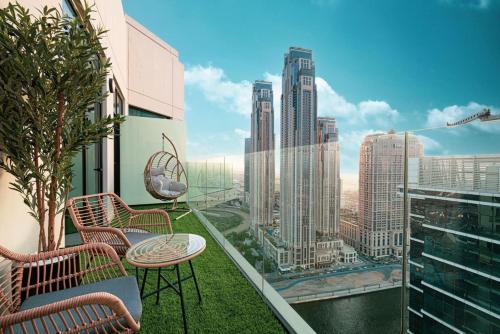 Infinity Pool - High-floor modern comfort - Incredible Views - 2BR 8 PAX, Dubai