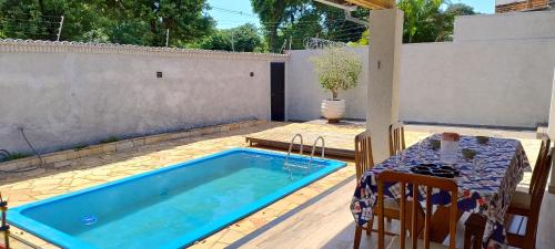 Casa com garagem wi-fi e área de lazer com piscina