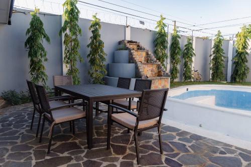 Casa Familiar con Piscina y Aire Acondicionado Concepción Batres (Casa Familiar con Piscina y Aire Acondicionado Concepcion Batres) in Jucuaran