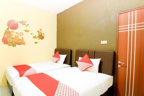 Capital O 217 A1 Hotel Room Type - Standard Twin Room