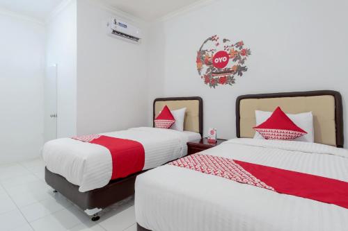 Delxue Twin Room room in Hotel O Titipapan Residence