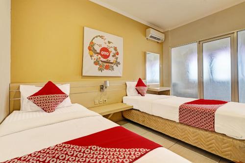 Delxue Twin Room room in Super OYO 389 Sky Guesthouse