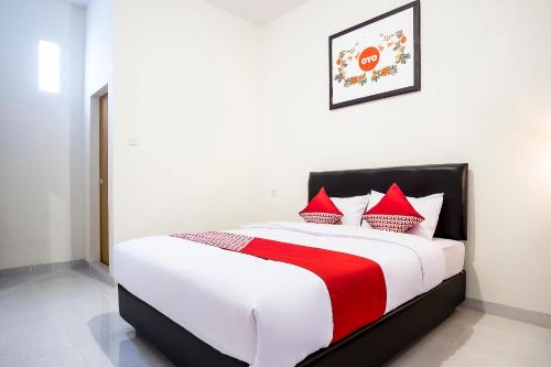 Deluxe Double Room room in Capital O 873 Kamani Homestay Syariah