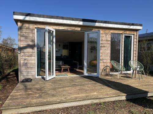 A szálláshely kívülről, Tinyhouse - De Esdoorn Zes in Verspreide huizen Neede