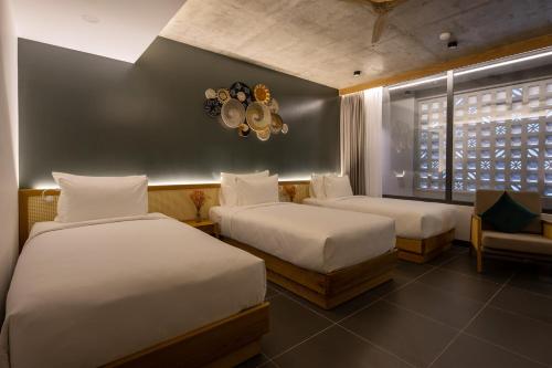 Triple Room room in Leaf Beachfront Hotel Da Nang