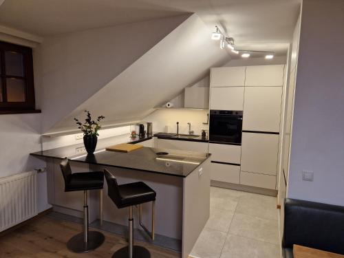 кухня, Ferienwohnung im Schlosshof in Мондзеє