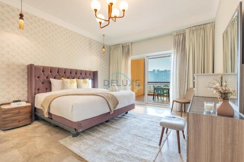 Beachfront 2BR and Assistant's Room with Sea Views Terrace, Steps From Iconic Landmarks & Amenities, The Residences South, Palm Jumeirah by Deluxe Holiday Homes, Dubaj (fotografie 2)