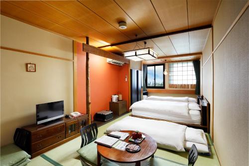 Quadruple Room with Shared Bathroom