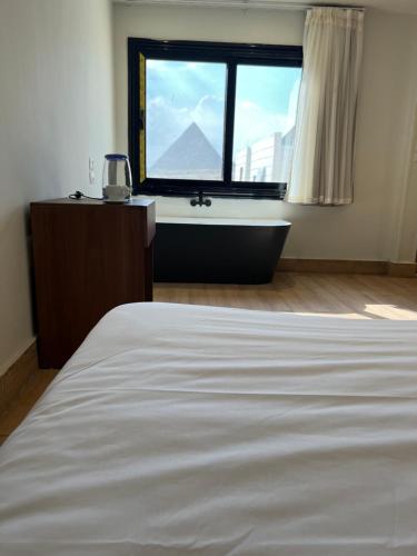 The Sphinx Of Pyramids INN