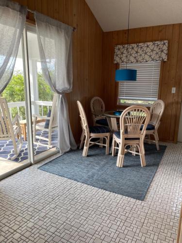 Easy Breezy - Waterfront Beach Bungalow with 150 Foot Dock on Guana Cay and Waterside Pergola in Great Guana Cay