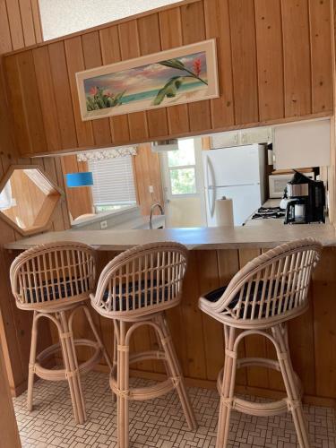 Easy Breezy - Waterfront Beach Bungalow with 150 Foot Dock on Guana Cay and Waterside Pergola in Great Guana Cay