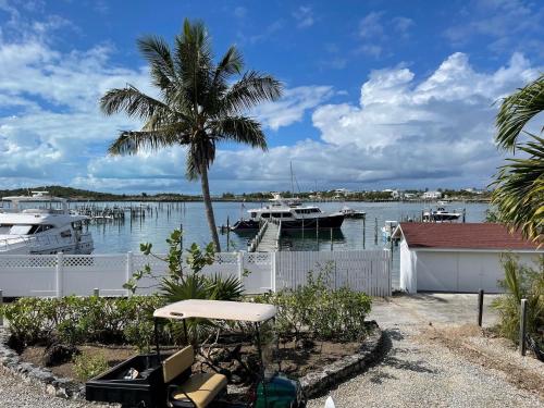 Easy Breezy - Waterfront Beach Bungalow with 150 Foot Dock on Guana Cay and Waterside Pergola in Great Guana Cay