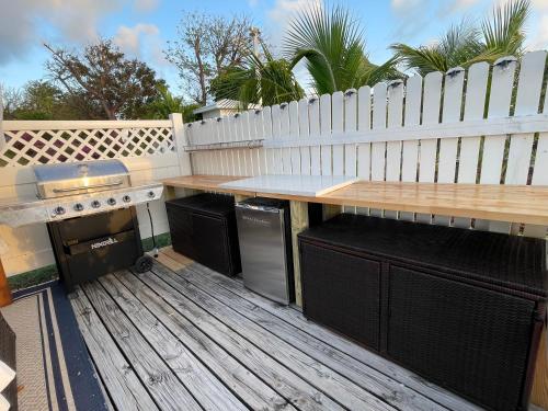 Easy Breezy - Waterfront Beach Bungalow with 150 Foot Dock on Guana Cay and Waterside Pergola in Great Guana Cay