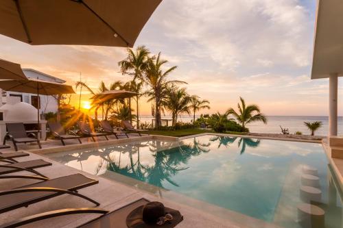 CASA MILAH TULUM 8BDR BEACH FRONT PRIVATE-CHEF VILLA WEDDINGS-RETREATS-FAMILY GATHERINGS by Bellamar in Akumal, Mexico