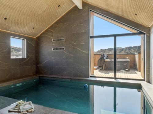 สระว่ายน้ำ, 5 star holiday home in Henne Beach in เฮนเน สตรันด์