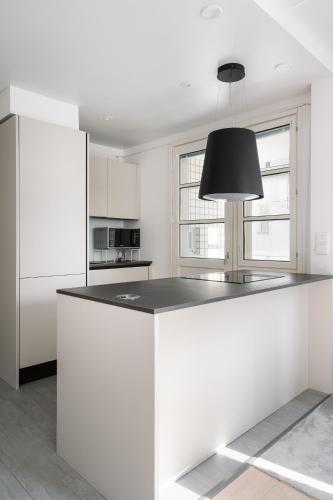 Kitchen, 1BR City Apartment with Balcony Next to the Sea in Vantaa