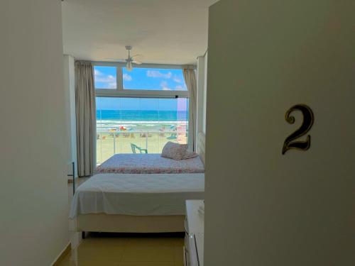 Suítes Pitangueiras - POUSADA FRENTE MAR (Suites Pitangueiras - POUSADA FRENTE MAR) in Guaruja