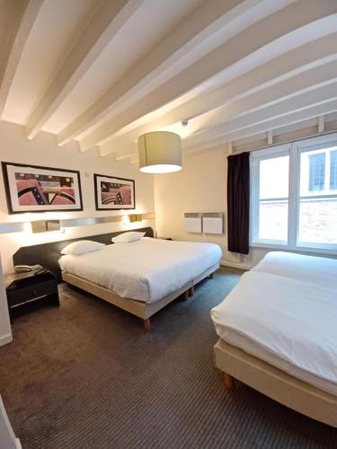 Quadruple Room with Private Bathroom room in Koffieboontje Budget