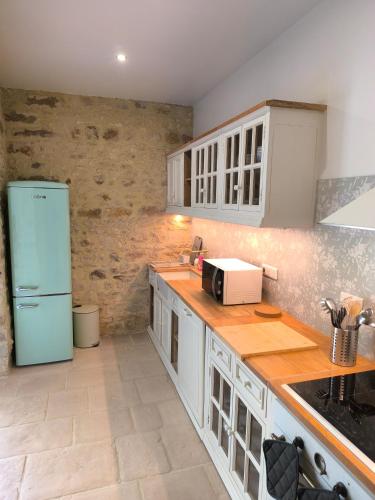 Belle Maison dans corps de ferme - logement Gabriel in อูรี