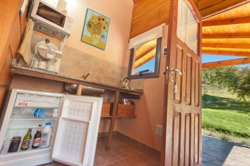 virtuve, Akapana Suites in Villa Berna