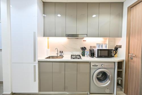 Facilities, Discover a cozy luxury studio with a refreshing pool, just a 10-minute journey from the city's heart in Nad Al Sheba