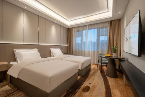Twin Room room in 忆泊城市酒店-临平宾馆