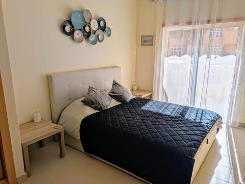 Two-Bedroom Apartment with Balcony room in Royal Cabanas Golf by Amandio Batista