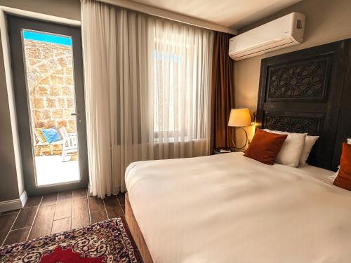 Osmanli Cappadocia Hotel - Tap to explore photos